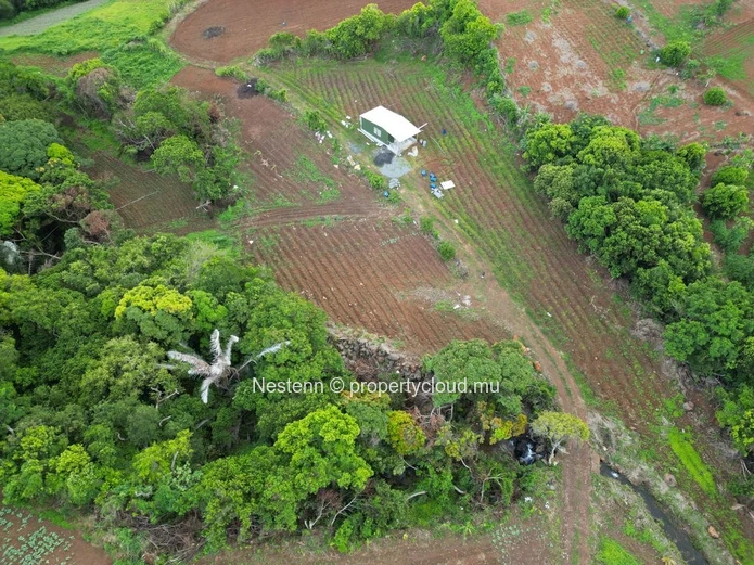 Residential land with mountain views with riverlet
