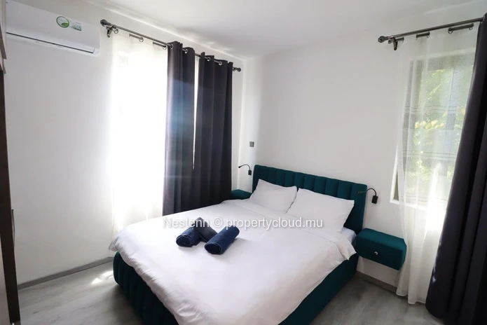 Modern Coastal Living – Elegant Fully Furnished Apartment at 3 mins from Flic en Flac Beach