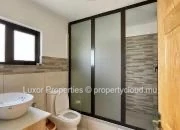 Enjoy breathtaking sea views and panoramic sights of Le Morne from this spacious and modern penthouse.