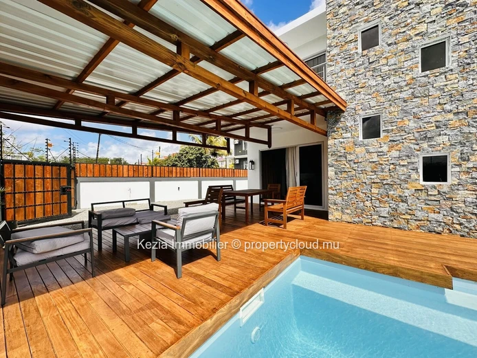 Elegance Of Wood And Stone In Trou Aux Biches