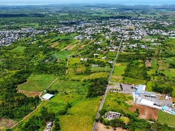 Golden Opportunity: Large Plot with Stunning Mountain and Sea Views, on the main road.