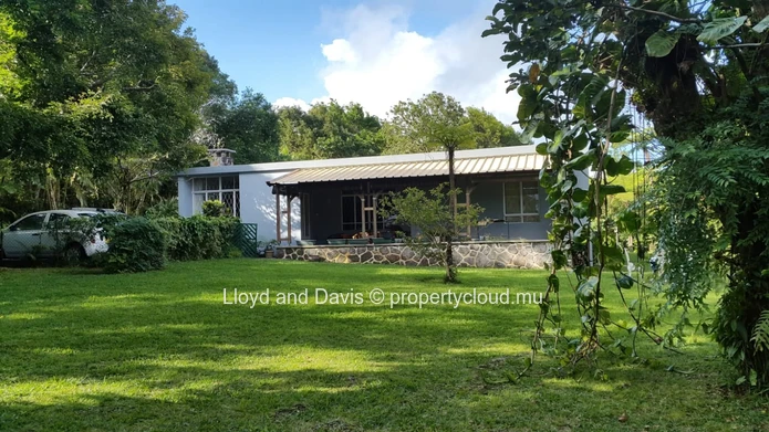 Versatile Residential Estate with Main House & Independent Cottage