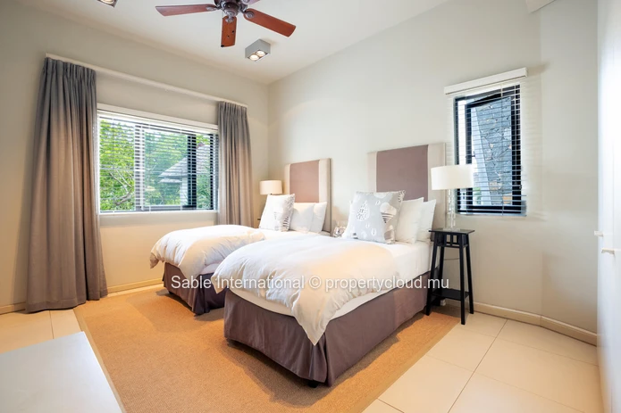 Luxurious Beachfront RES Apartment in Rivière Noire with stunning views and modern amenities. 4 bedrooms, sea access,...