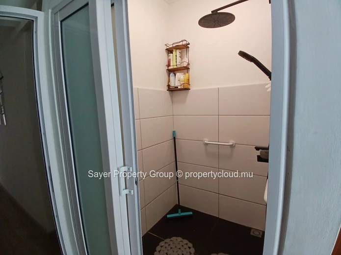 Rare Opportunity: Spacious Top Floor Apartment with Ocean Views