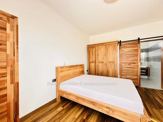 Elegance Of Wood And Stone In Trou Aux Biches