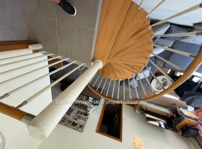 Luxurious Beachfront Penthouse in Péreybère with Easy Sea Acess and Resort-style Amenities! 