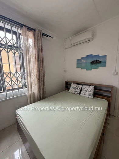 2-Bedroom Apartment in Flic en Flac | Rooftop Sea Views | Pool & Party Area 
