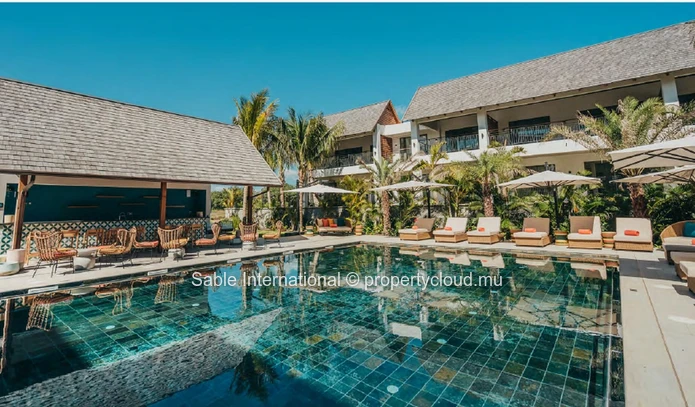 Luxury RES Apartment with Communal Pool in Prime Grand Baie Location! 2 Beds, Balcony, Indoor Spa, Close to Amenities.