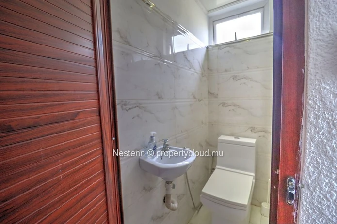 3-bedroom family home with garage and balcony – Pointe aux Biches
