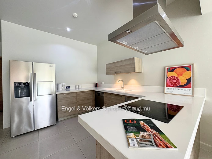 Exceptional Three-Bedroom Apartment with Panoramic Marina and Mountain Views