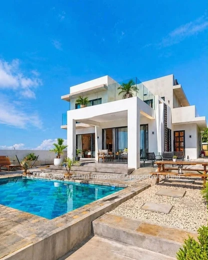 Villa moderne de 4 chambres en suite avec piscine privée- Morcellement sécurisé.