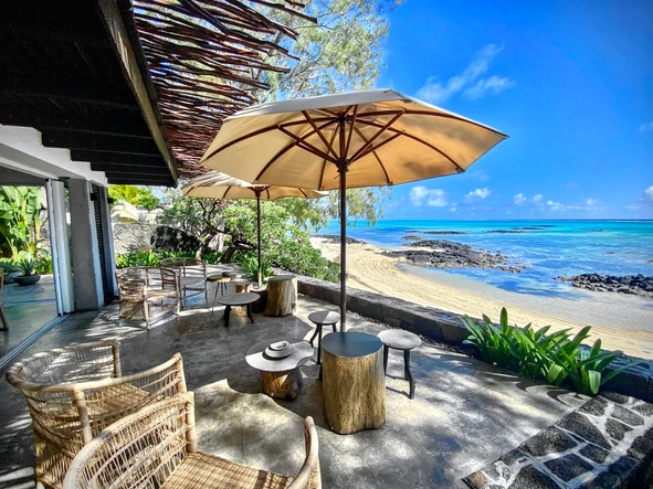 Stunning beachfront villa for rent at Roches Noires,  Fully furnished with elegance and style. 