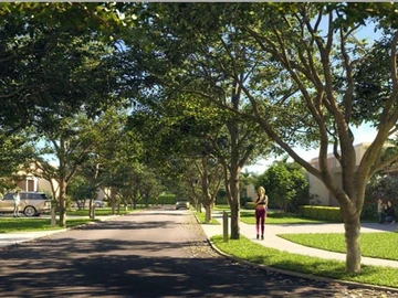 Introducing boundary-less living : open front yard plots in a well landscaped, green ,secured and gated morcellement.