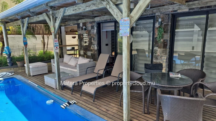 Une belle maison familiale de 3 chambres au cœur de Flic en Flac à seulement 5 minutes en voiture de la plage.