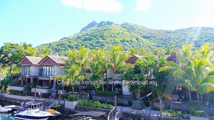 Experience luxury waterfront living with this exquisite 3-bedroom duplex for sale.