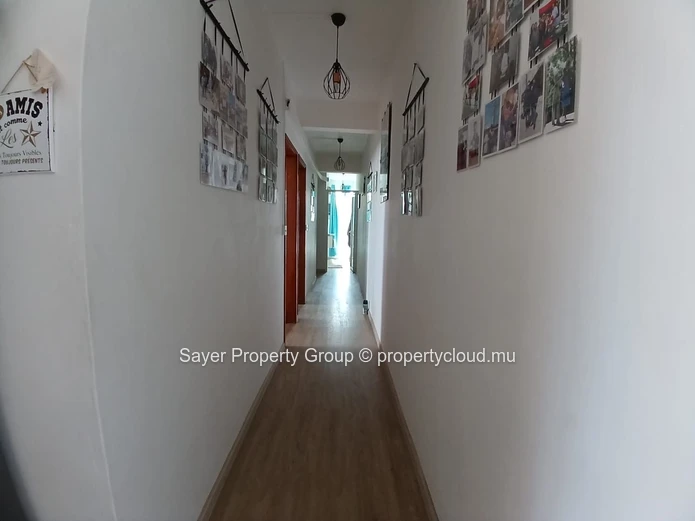 Rare Opportunity: Spacious Top Floor Apartment with Ocean Views