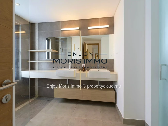 Appartement de prestige 3 chambres à vendre – Trou aux Biches | 180 m² | Accès plage à pied | Piscine lagon