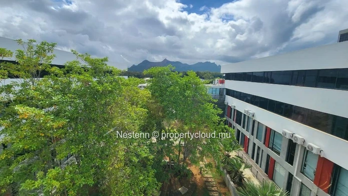 Furnished office space in Ebène of 28 m², air conditioning, private lift, secured parking, mountain view, and close t...