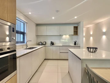 Elegant Lagoon-Level Apartment in Black River – Garden, Light & Privacy