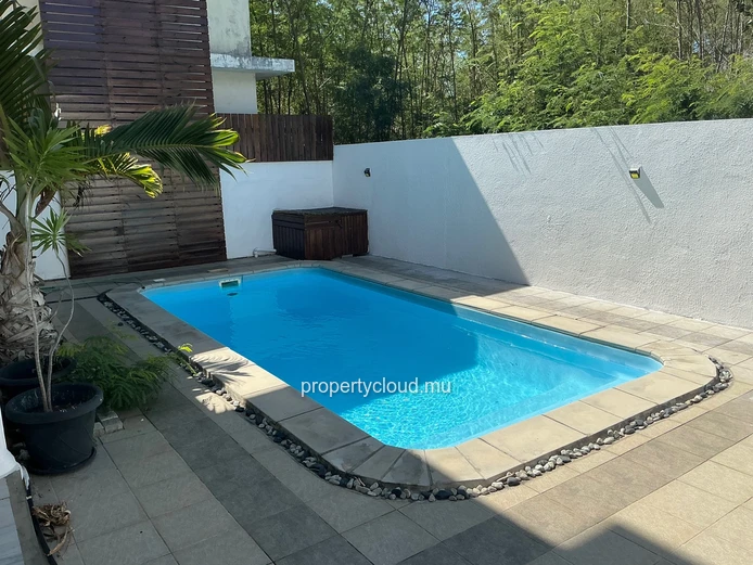 For sale in Mont Choisy, 300m from the beach. 4-bedroom villa + rooftop terrace. Reserved for local market - rare inv...