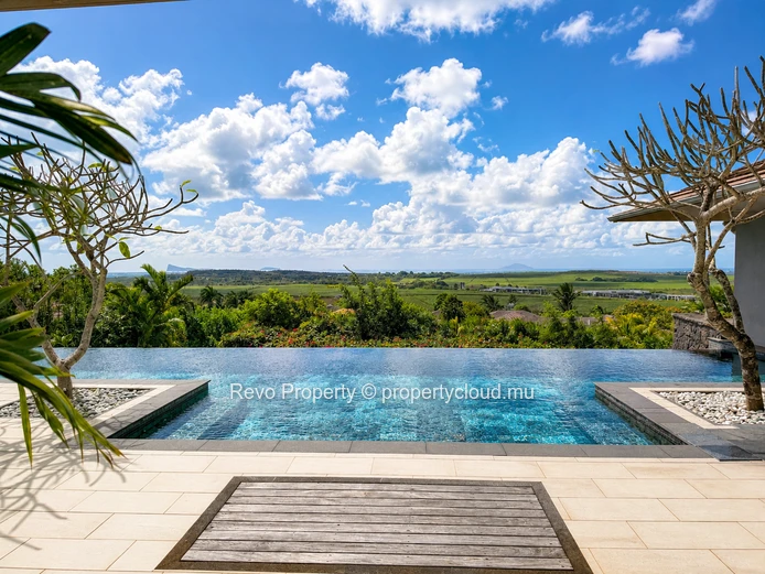 A 6-Bedroom Hillside Sanctuary with Panoramic Ocean Views.