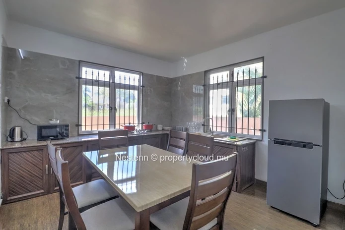 Spacious traditional triplex apartment in Grand Baie with 2 bedrooms, furnished, air conditioning, veranda, and close...