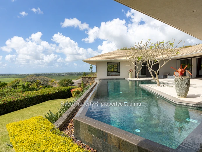 A 6-Bedroom Hillside Sanctuary with Panoramic Ocean Views.
