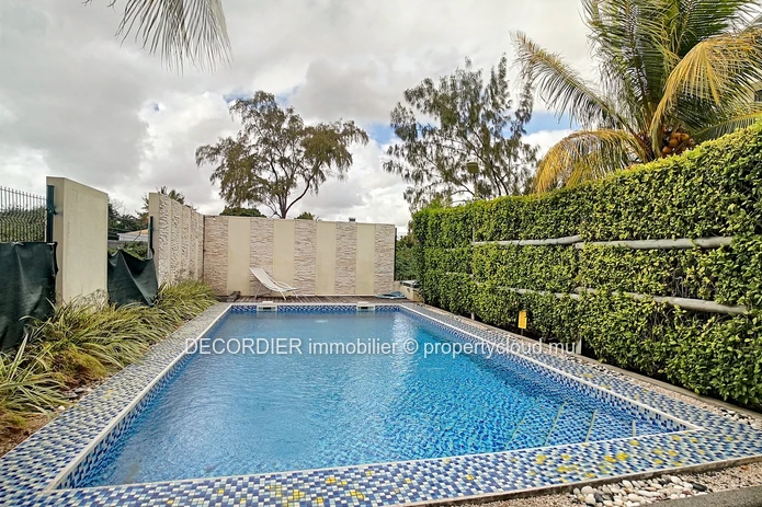 Duplex in residence with communal swimming pool
