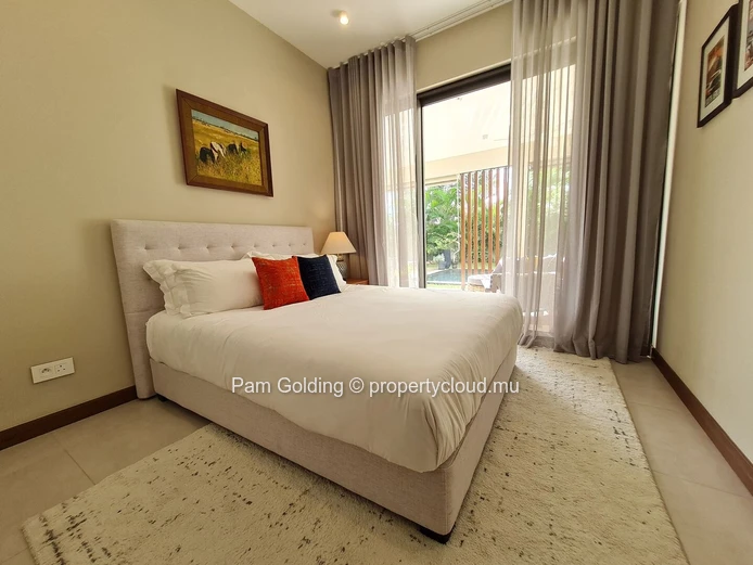 Appartement de 2 chambres en rez-de-jardin à vendre à Pointe aux Canonniers, Île Maurice | Jardin, piscine et plage à... (Mandat exclusif)