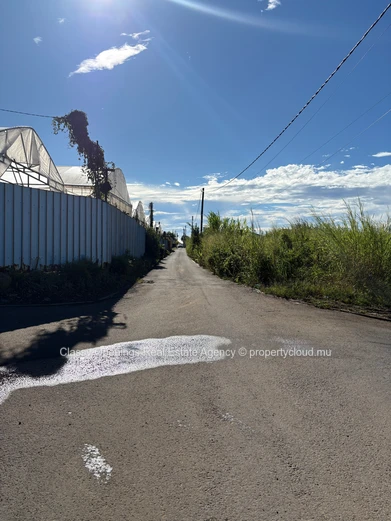 Prime 4,200m² Commercial Plot in Petit Camp — Mountain Views & Near Bus