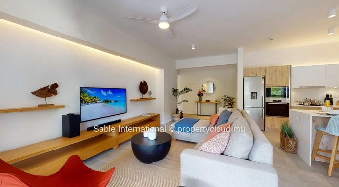 Luxury RES Apartment with Communal Pool in Prime Grand Baie Location! 2 Beds, Balcony, Indoor Spa, Close to Amenities.