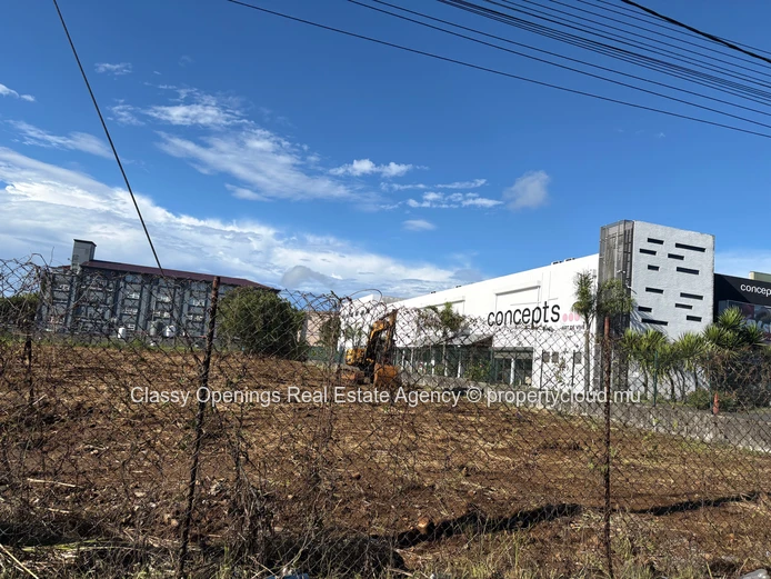 Prime 4,200m² Commercial Plot in Petit Camp — Mountain Views & Near Bus