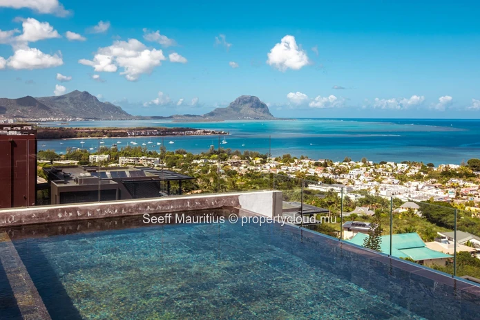 Rêve insulaire : superbe villa avec vue imprenable sur le lagon