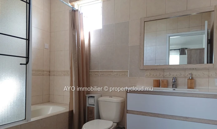 Townhouse de 4 chambres avec piscine commune à Grand Baie
