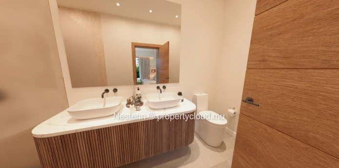 2-bed villa in a preserved region close to the beach. 
