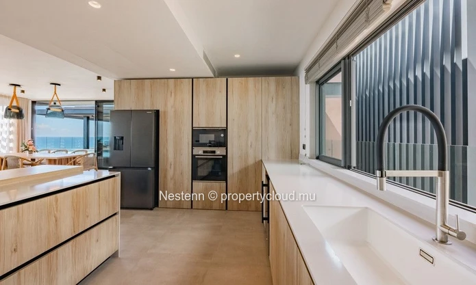 Suspended above the lagoon, an exceptional 4-bedroom en suite villa