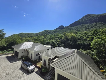 Luxury 3-Bedroom Executive Apartment with Stunning Moka Mountain Views in the Heart of the Business