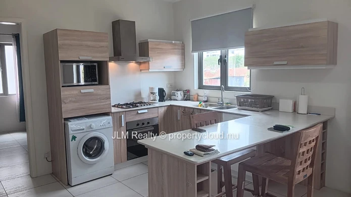 For Rent: Furnished Apartment with Rooftop Terrace and Swimming Pool in Flic-en-Flac, Mauritius