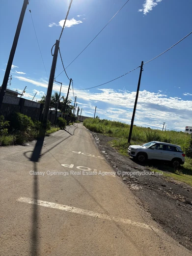 Prime 4,200m² Commercial Plot in Petit Camp — Mountain Views & Near Bus