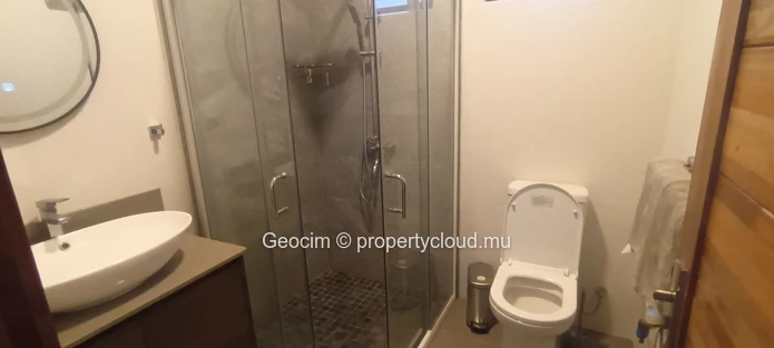 Flic en Flac Green Creek fully furnished modern 3 bedrooms flat. Ground floor. Terrace. Private parking. Shared swimm... (Sole Mandate)
