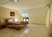 Enjoy breathtaking sea views and panoramic sights of Le Morne from this spacious and modern penthouse.
