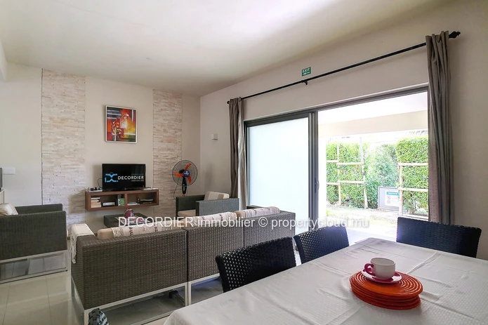 Duplex in residence with communal swimming pool