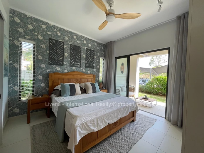 Élégant Appartement au Rez-de-Chaussée de 2 Chambres